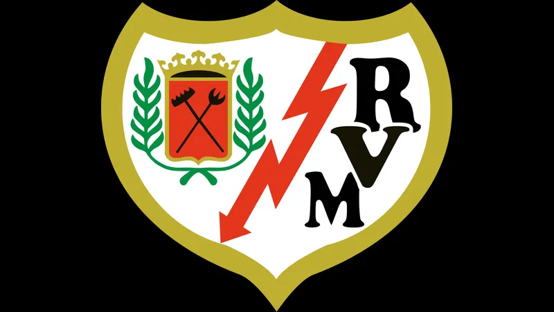 Cầu thủ của Rayo Vallecano và Atletico Madrid tranh chấp bóng Cầu thủ của Rayo Vallecano và Atletico Madrid tranh chấp bóng